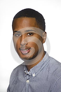 Young man in dress shirt isolated against white