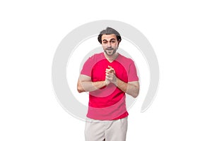 young man dressed in a red t-shirt with a mockup for an identity on a white background