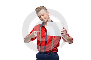 Young man dressed in rock`n`roll or rockabilly style