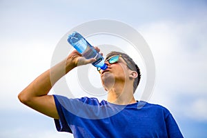 Young Man drink a Water