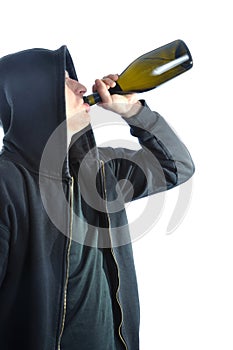 Young man drinking alcohol, isolated on white back