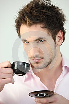 Young man drinking coffee