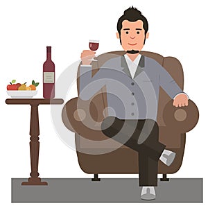 Young man drinking red wine