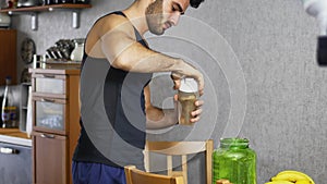 Young man drinking a smoothie drink or a protein shake