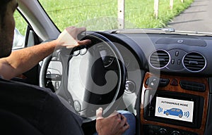 young man on a driverless car