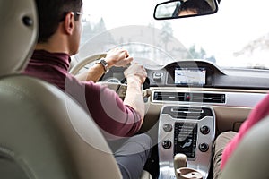 Young man driving a car