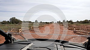 Young man driving the car. Front view