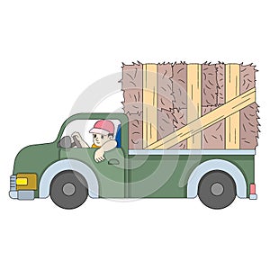 young man driving pickup truck hauling hay to customers