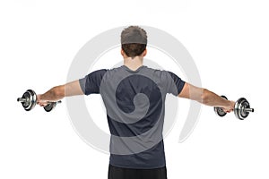 Young man with dumbbells exercising