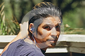 Young Man with Ear Buds