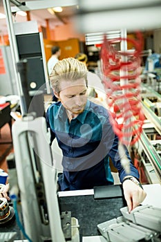 Young man in electronics workshop