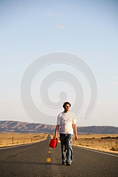 Young Man with Empty Gas Can