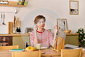 Young man engaged in e-learning