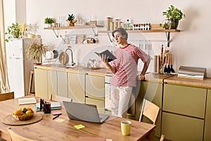 Young man engages in study from