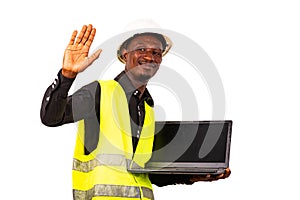 Young man engineer holding laptop computer smiling