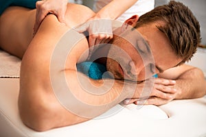 Young man enjoying a massage