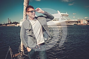 Young man enjoying ride on a yacht