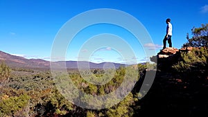 Young man enjoying a spectacular Wilpena Pound view