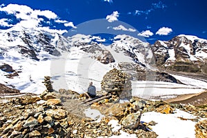 Young man enjoying the stunning view of Morteratsch glacier