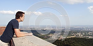 Young man enjoying view - panorama