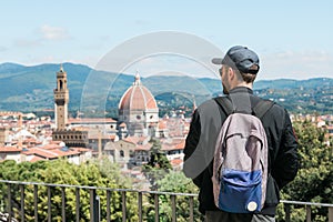 Young man enjoying a view of panorama of Florence