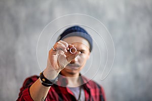 Young man evaluating the ring