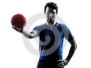 Young man exercising handball player silhouette