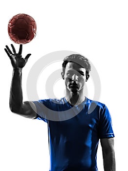 Young man exercising handball player silhouette