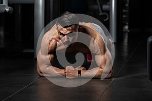 Young Man Exercising Pushups