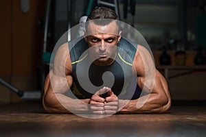 Young Man Exercising Pushups