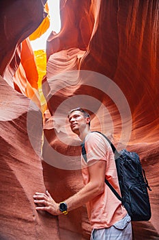 Young man exploring Antelope Canyon in the Navajo