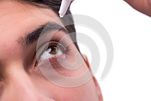 The young man in eye care medical concept