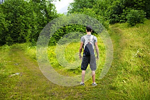 Young man facing choice between two different path