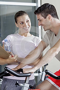 Young man with female trainer