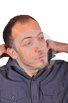 Young man fixes the collar of the shirt