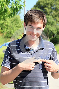 Young man with flower