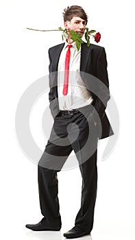 Young man, flower, red rose isolated