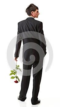 Young man, flower, red rose isolated