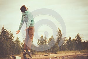 Young Man Flying levitation jumping outdoor