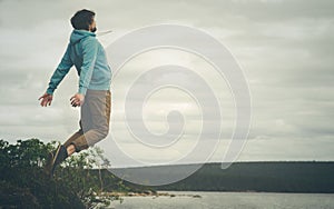 Young Man Flying levitation jumping outdoor