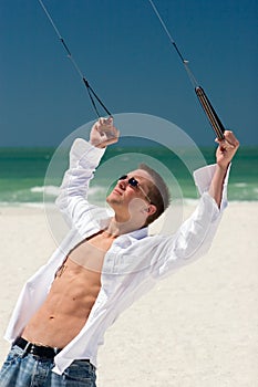 Young Man Flying a Stunt Kite