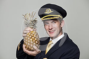 Young man in the form of a passenger plane pilot