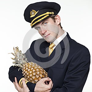 Young man in the form of a passenger plane pilot