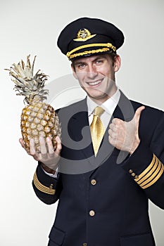 Young man in the form of a passenger plane pilot