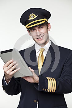 Young man in the form of a passenger plane pilot