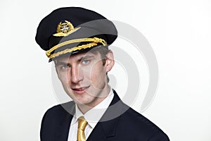 Young man in the form of a passenger plane pilot