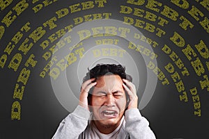 Young Man Frustrated about Debt, headache, stress and dizzy gesture