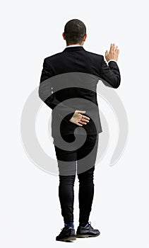 young man in full growth. isolated on white background. view from the back