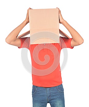 Young man gesturing with a cardboard box on his head