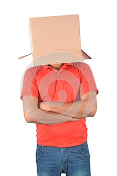 Young man gesturing with a cardboard box on his head isolated on